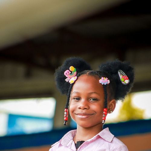 Girl with her hair in two puffs