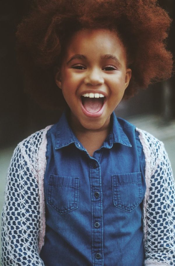 Girl in a denim button-down shirt